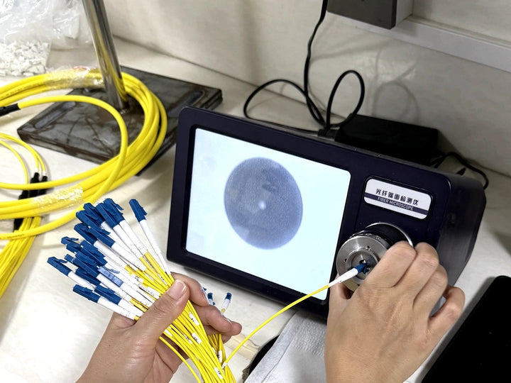 Fiber connector end-face inspection under a production microscope